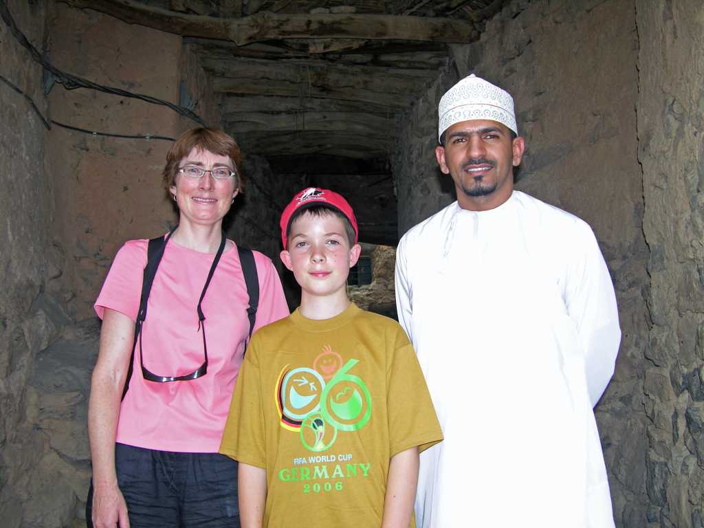 Muscat 07 03 Misfah Our Tour Guide Here we are at the entrance to the village of Misfah, with our knowledgeable local guide.